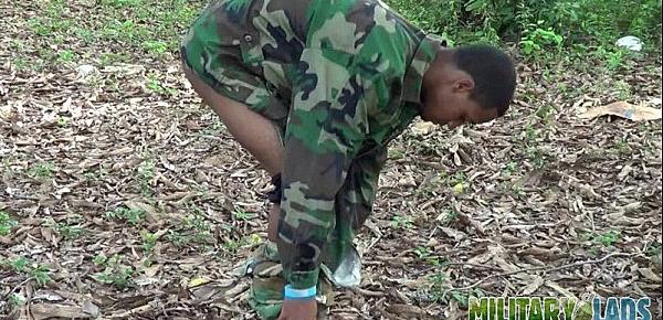  Army boy strokes his wood in the woods